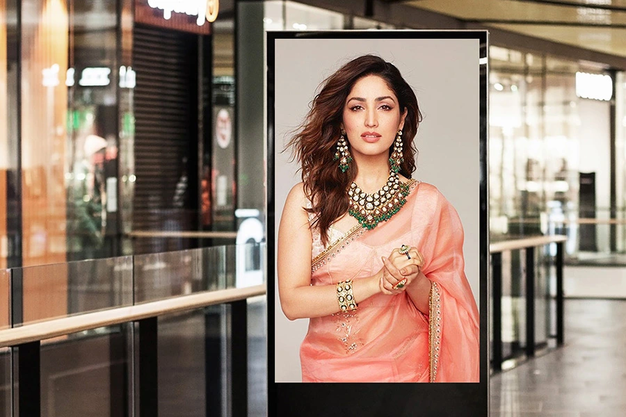 Full HD digital standee displaying promotional content in a retail store.