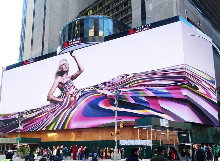 Outdoor Active LED display screen wall for brand advertising on a busy street in India.
