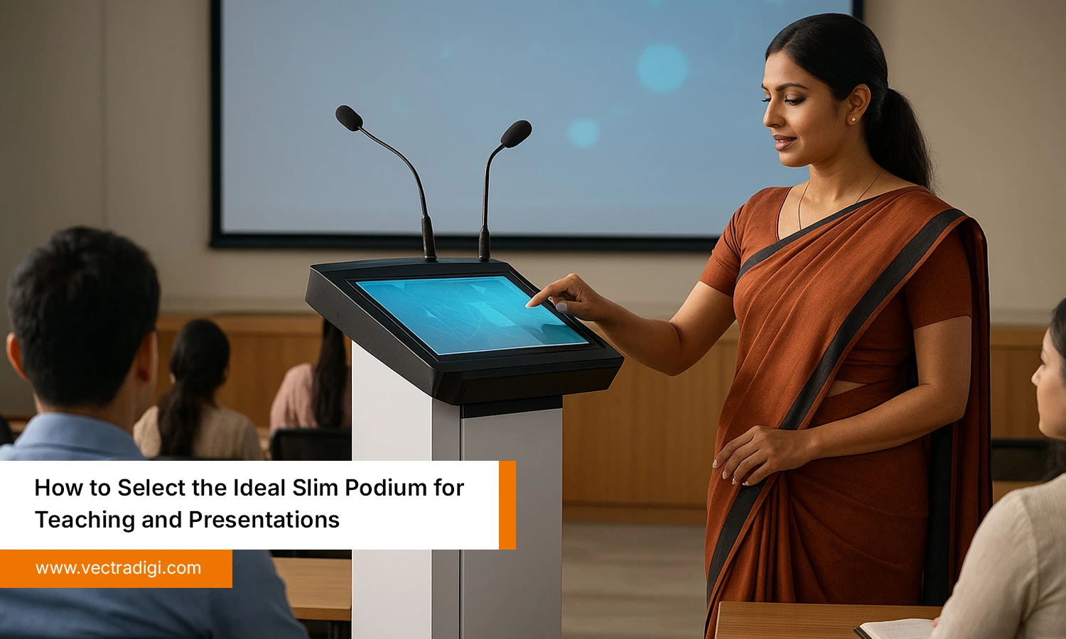 Indian teacher using VectraDigi slim podium with touchscreen and mics during classroom presentation session.