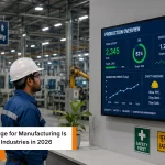 Digital signage for manufacturing displayed inside a modern Indian smart factory facility.