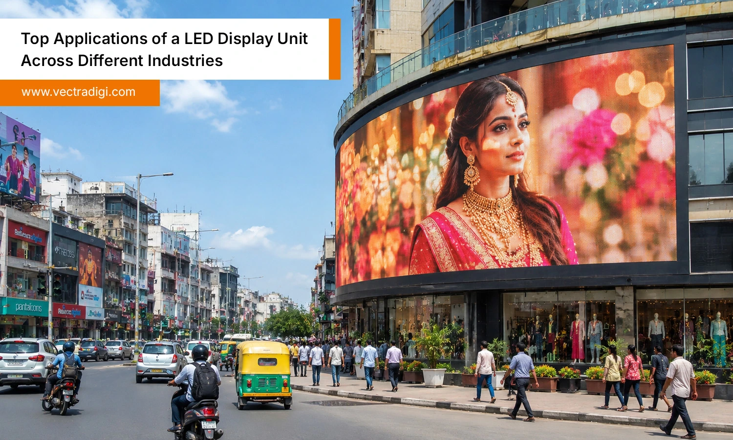 Indian city street showcasing a led display unit for digital advertising in a vibrant commercial area.