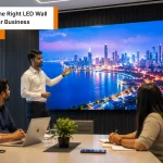 Indian business professionals evaluating a premium LED display solution from a trusted LED wall company in a modern corporate office.