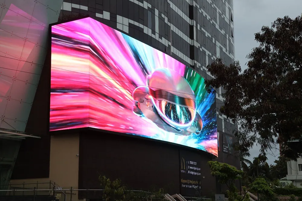 Outdoor LED display panel displaying a marketing campaign for a small business.