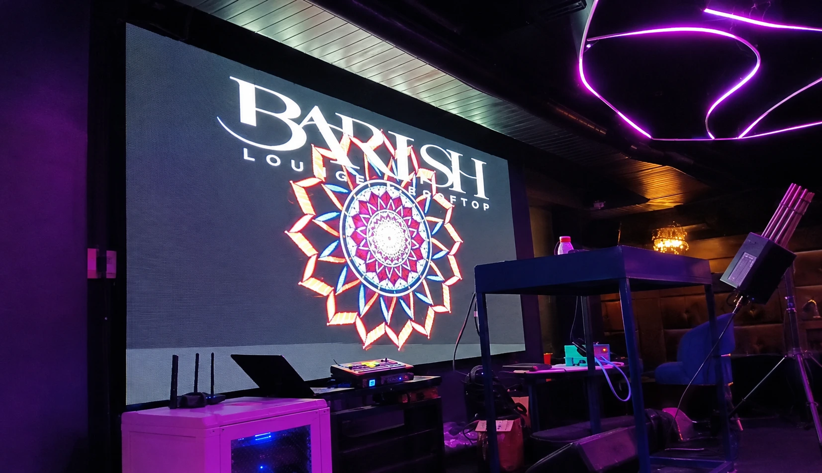 P2.5 indoor LED display screen installed at Barish Club in Noida, showing vibrant graphics and visuals.