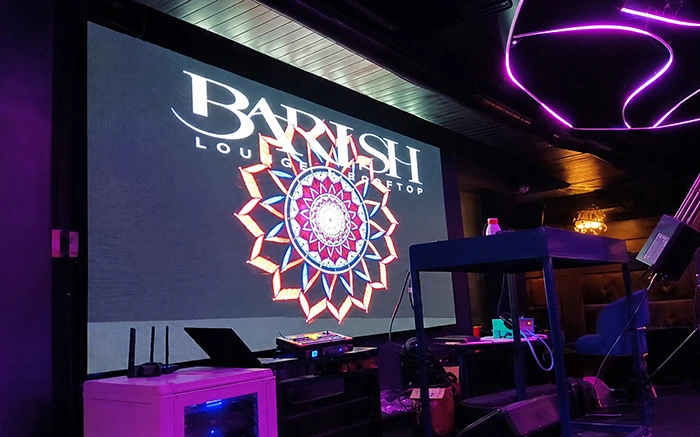 Indoor LED wall at Barish Club, Noida, displaying colourful digital content in a modern entertainment venue.